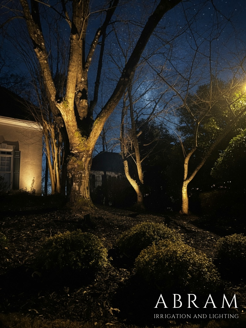 Home and landscape lit warmly in the evening